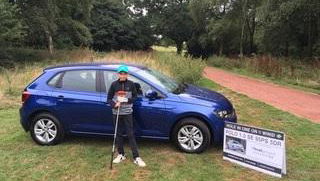 Young lad makes ace, wins car he's not old enough to drive!